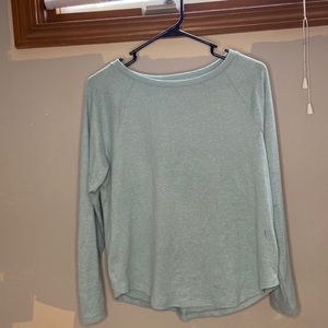 Long sleeved teal shirt